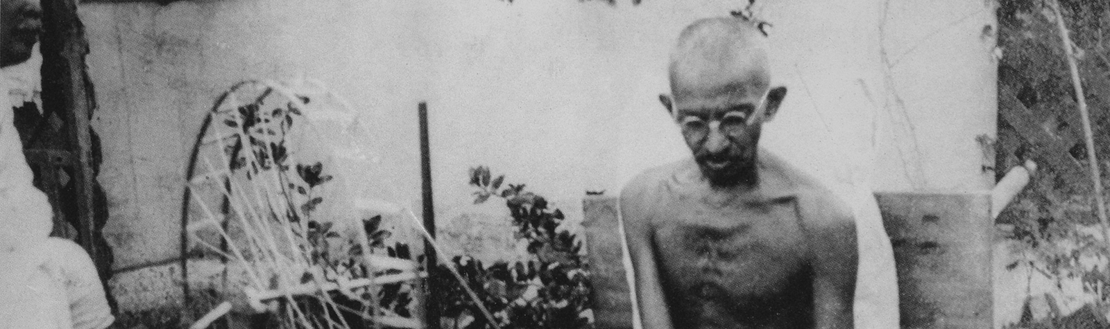 Mahatma Gandhi spinning with a charkha